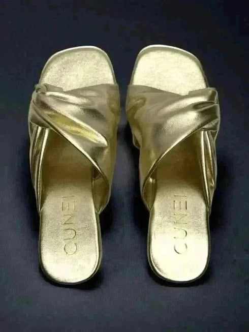Wrapped in Gold Wedges - cunei
